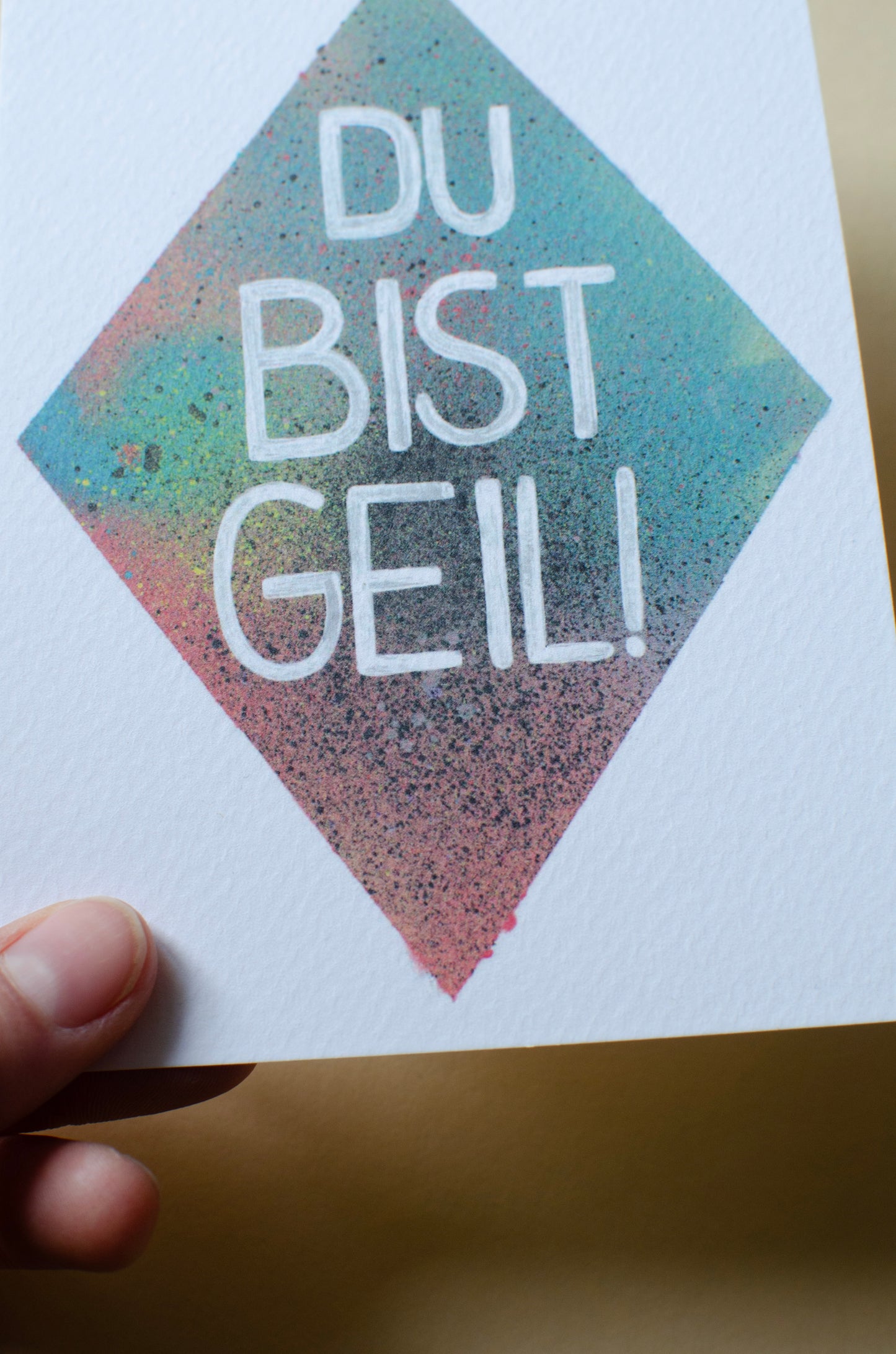 Kunstpostkarte, mit Aufschrift - Du bist geil! - bunter Hintergrund