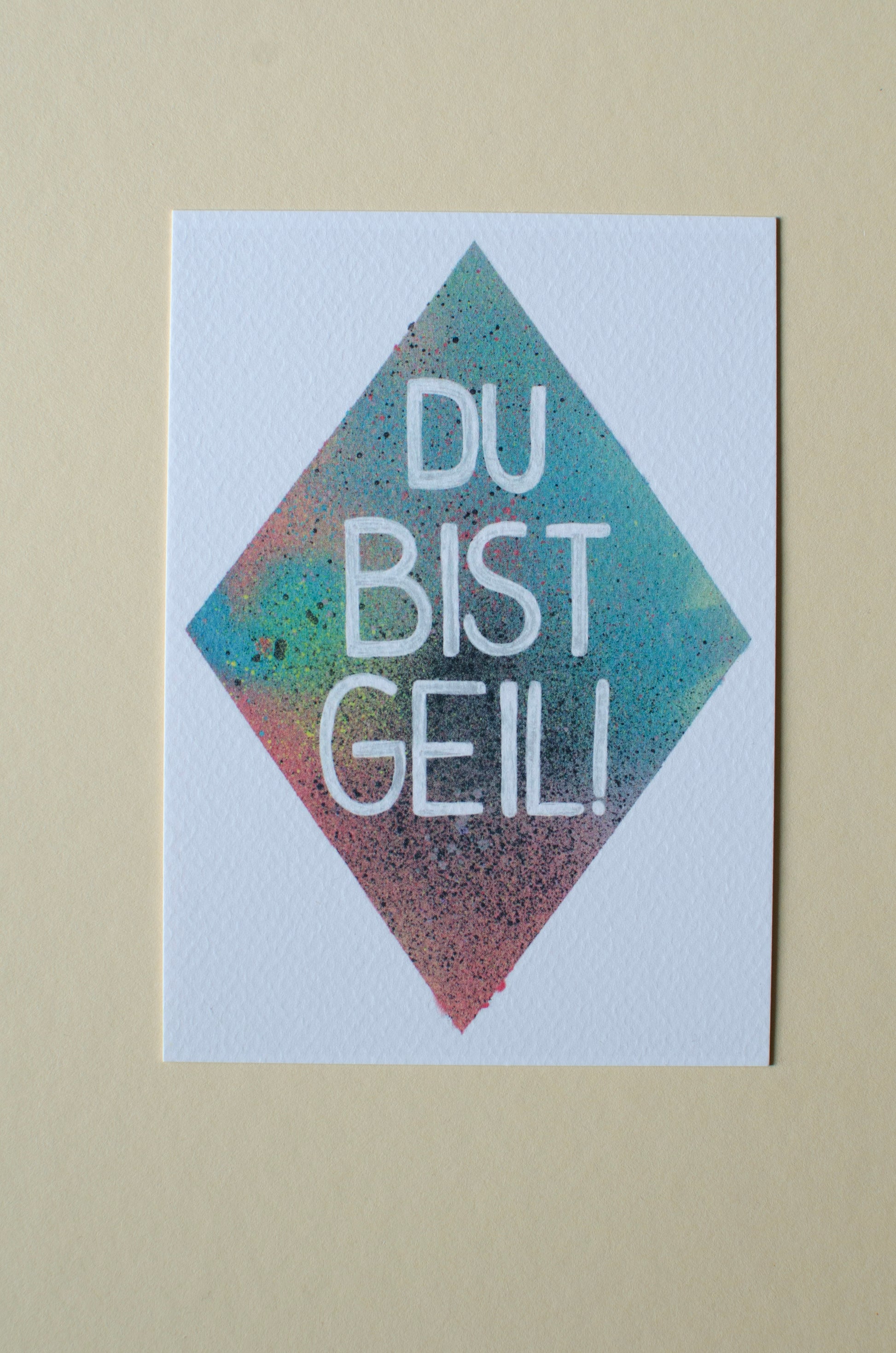 Kunstpostkarte, mit Aufschrift - Du bist geil! - bunter Hintergrund